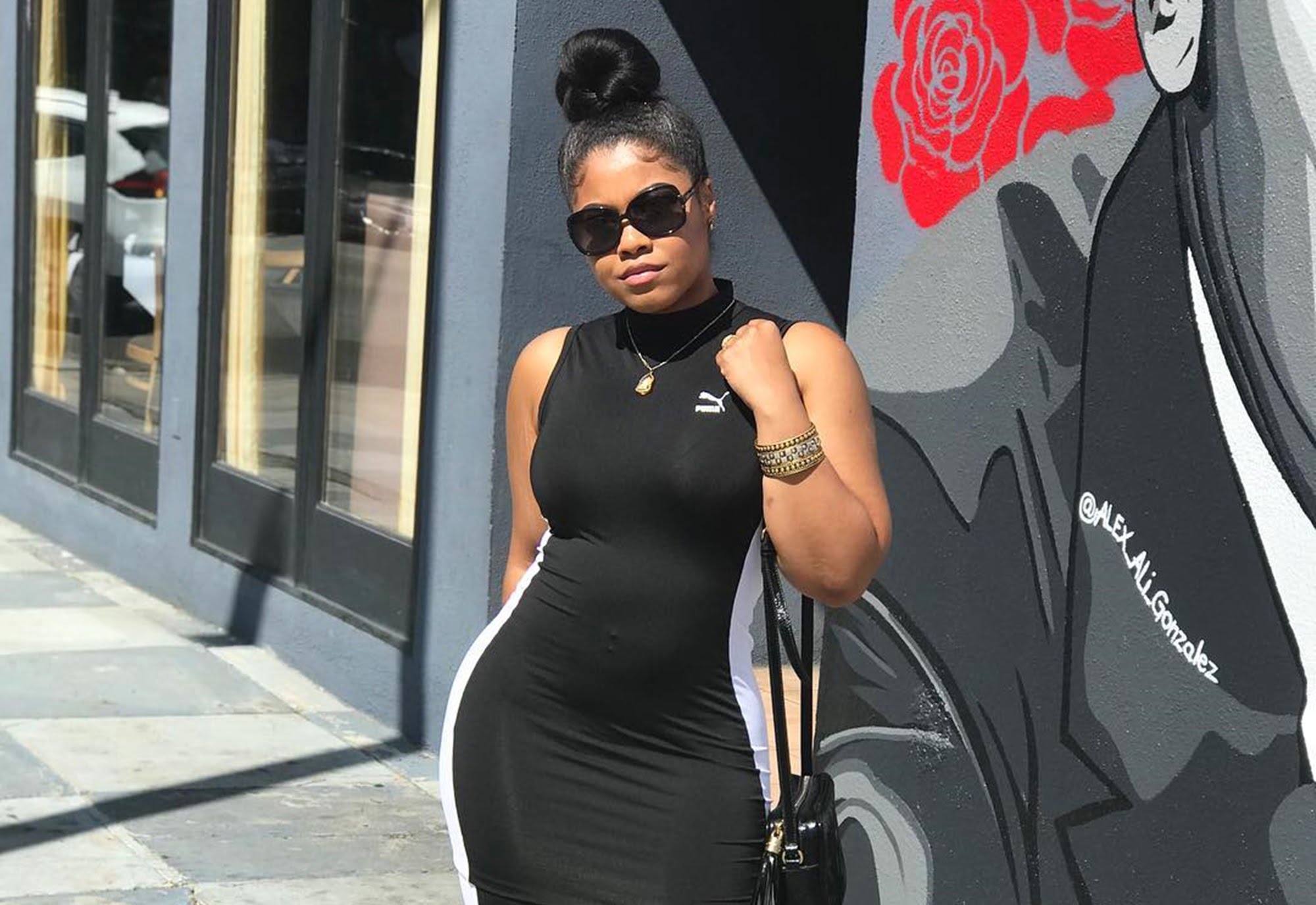 Rapper Nas’ Daughter Destiny Stuns in Skintight Orange Dress