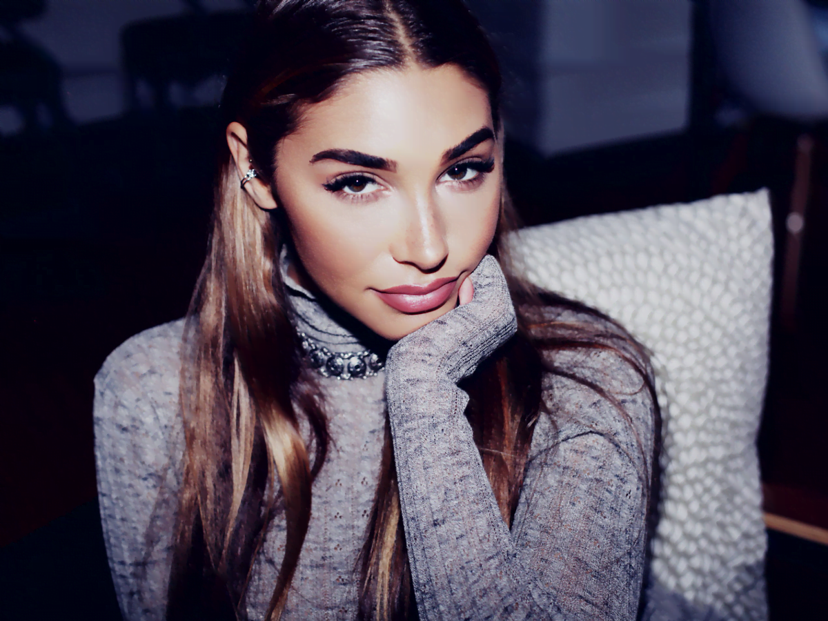 Chantel Jeffries Displays Taut Midriff Next to Her Tesla
