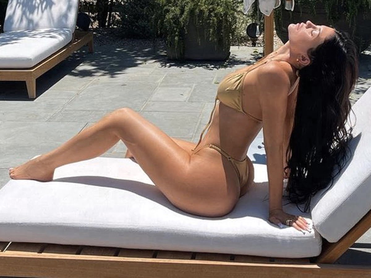 Kylie Jenner Flaunts Killer Curves Amid Pregnancy News
