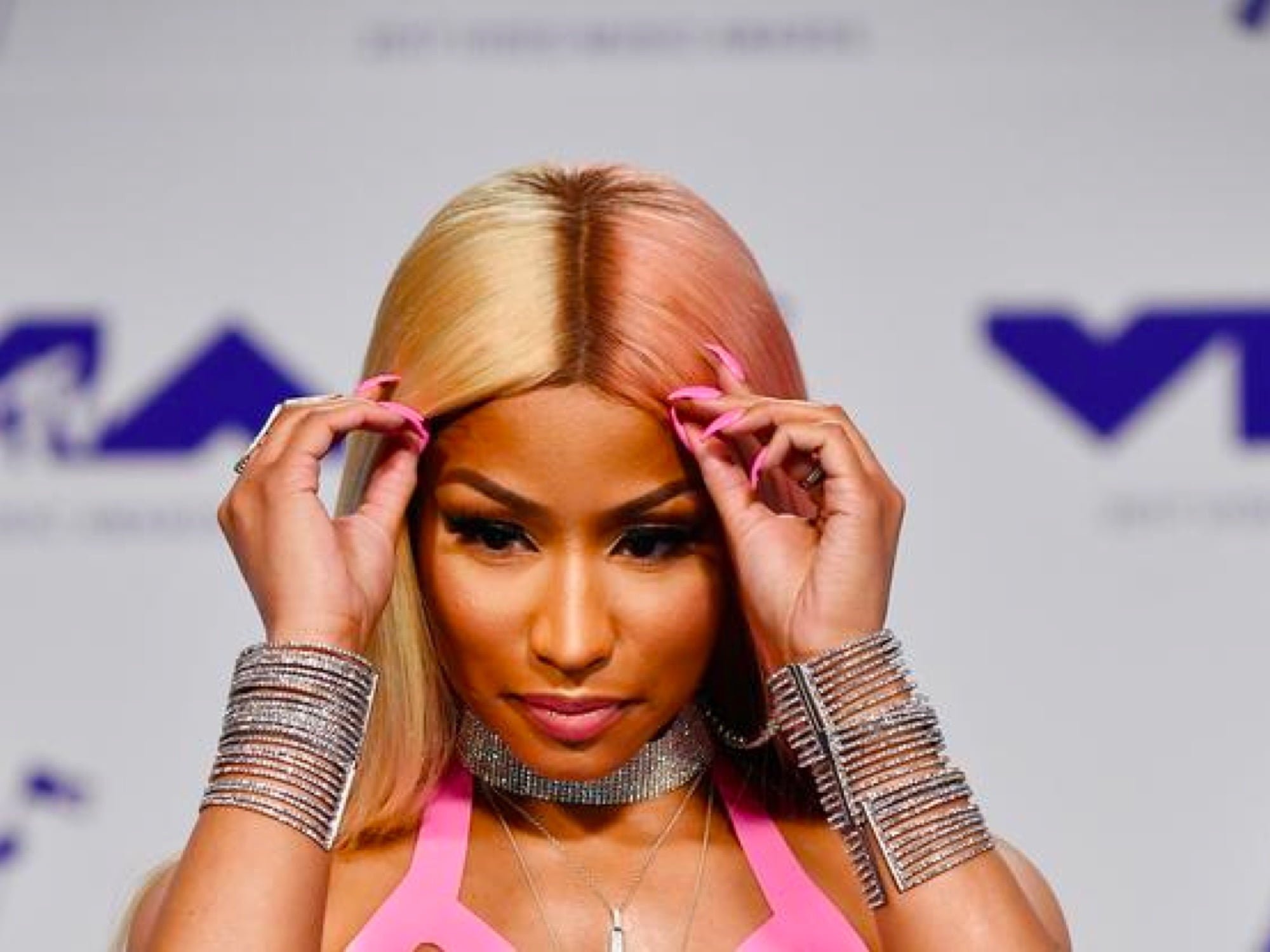Nicki Minaj Posts Burberry Photo Dump, Teases Lyrics