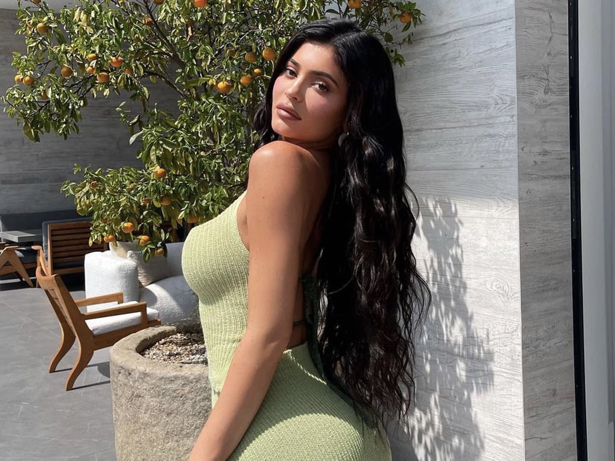 Proud Mommy Kylie Jenner Struts Baby Bump in Tight White Mini Dress