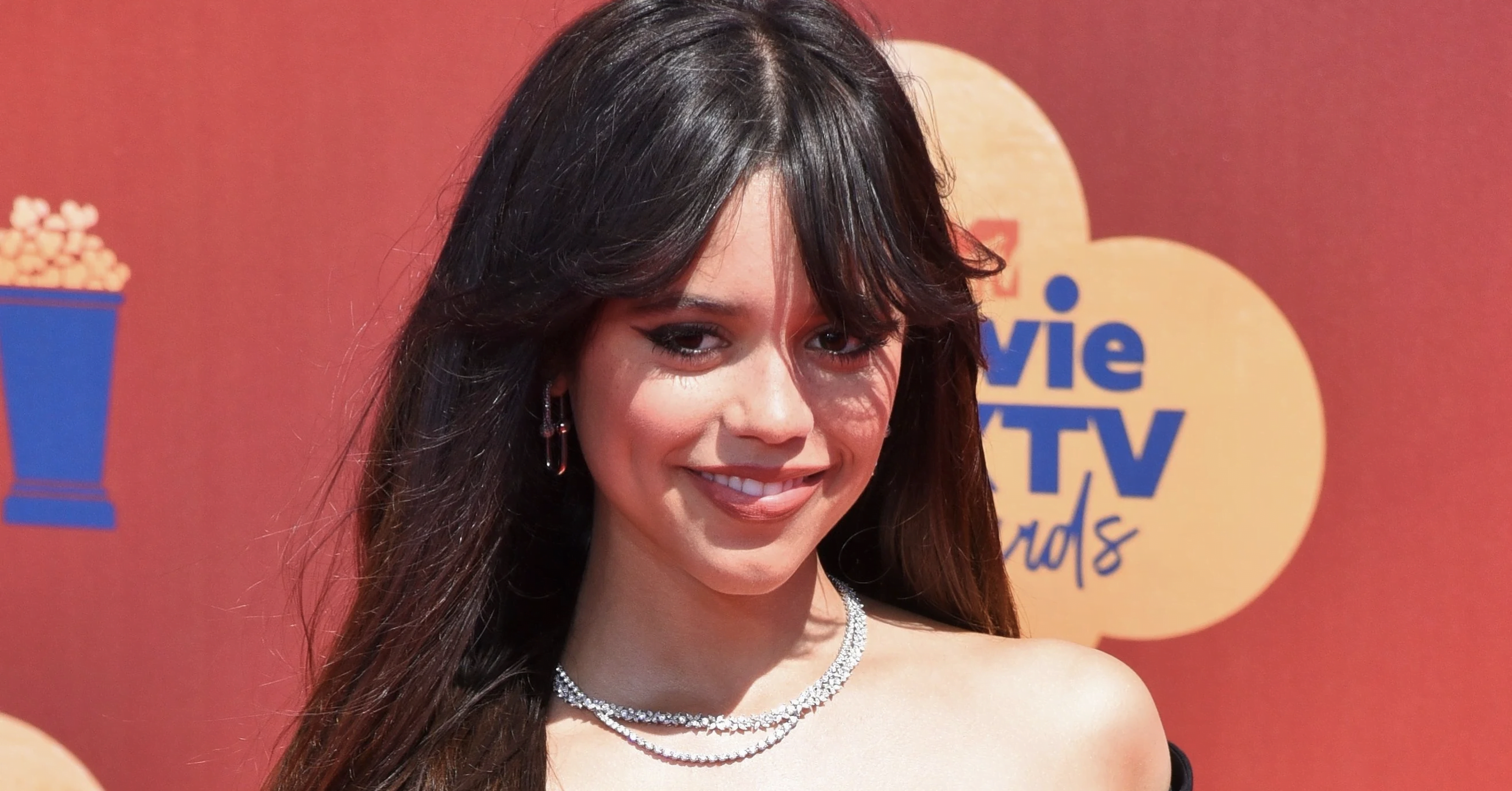 Jenna Ortega's White-Hot Glam- Fans Fawn Over Risqué Red Carpet Attire